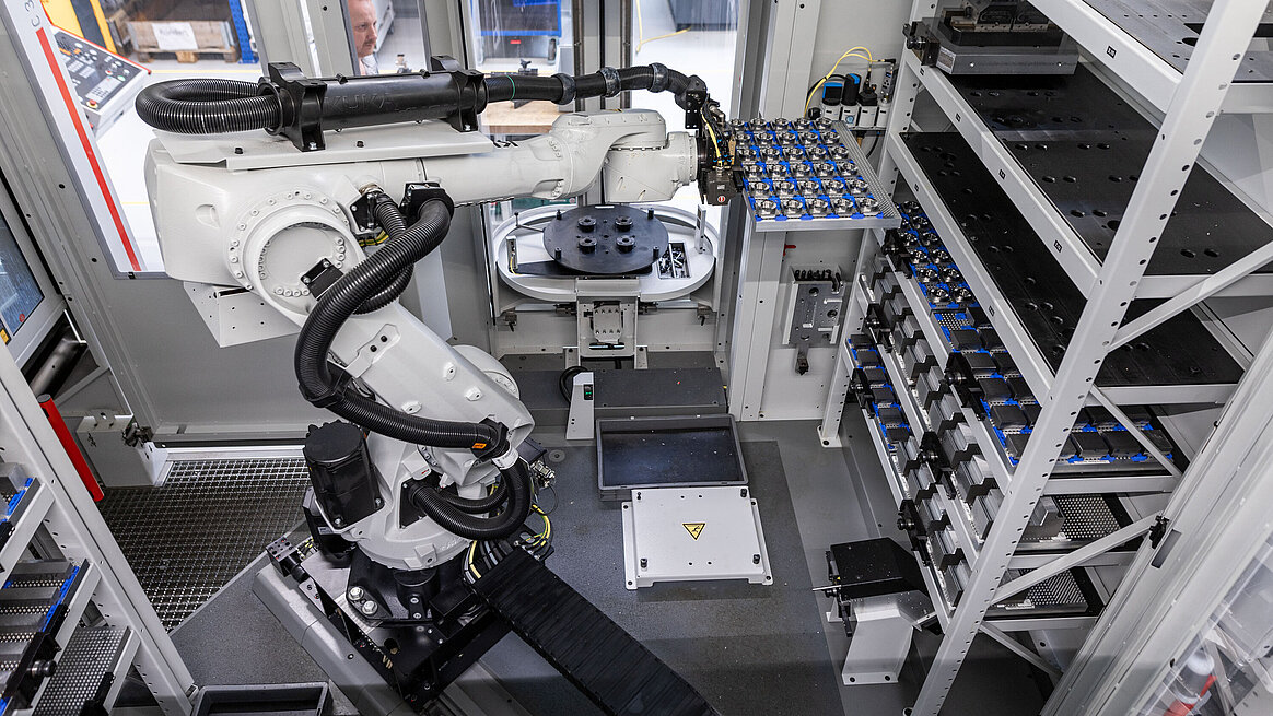 HERMLE RS 1 robot system has two racks with space for eight pallets each.